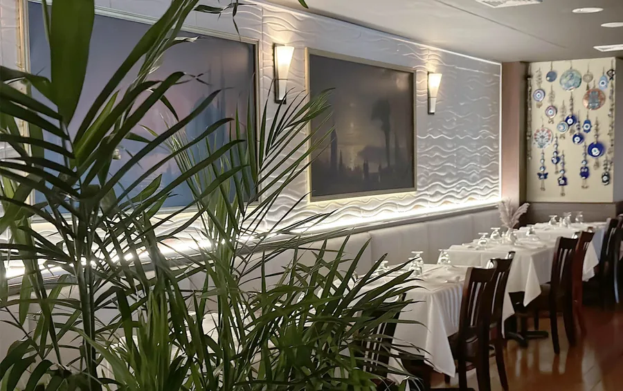 Banquette seating beneath the nazar wall